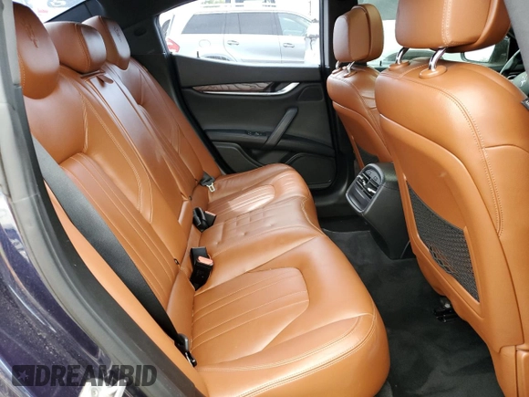 2015 Maserati Ghibli S Q4 z VIN ZAM57RTA1F1161983, wystawiony jako Copart lot #54793155 z przebiegiem 102 487 mil mil oraz Tytuł czysty. Historia ofert i sprzedaży dostępna na DreamBid. Obrazek 10.