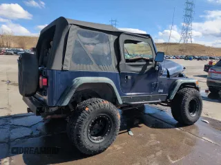 1997 Jeep Wrangler SE z VIN 1J4FY29P1VP441353, wystawiony jako Copart lot #51691545 z przebiegiem Nie podano mil oraz Szkoda całkowita • Salvage title. Historia ofert i sprzedaży dostępna na DreamBid. Obrazek 3.