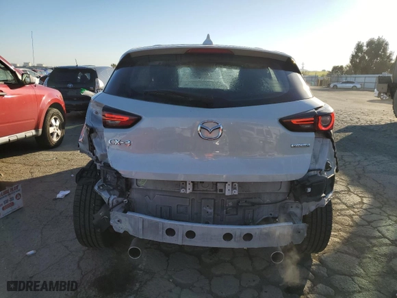 2021 Mazda CX-3 Sport with VIN JM1DKDB70M1500172, listed as a Copart auction lot 42643785 with 65,397 mi miles and Salvage Title. Bid and sale history available at carsss.com. Image 6.