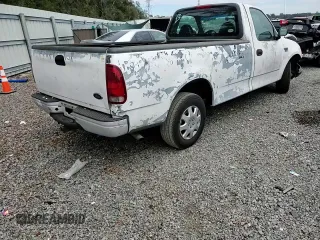 1999 Ford F-150 z VIN 1FTRF17W0XNB79739, wystawiony jako Copart lot #87840925 z przebiegiem Nie podano mil oraz Szkoda całkowita • Salvage title. Historia ofert i sprzedaży dostępna na DreamBid. Obrazek 11.