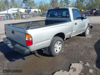 2003 Toyota Tacoma with VIN 5TENL42N03Z269410, listed as a IAAI auction lot 42002987 with 214,782 mi miles. Bid and sale history available at carsss.com. Image 4.