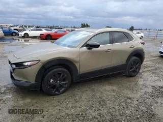 2024 Mazda CX-30 2.5 Carbon Turbo with VIN 3MVDMBXY3RM606382, listed as a Copart auction lot 83982064 with 31,686 mi miles and Salvage Title. Bid and sale history available at carsss.com. Image 1.