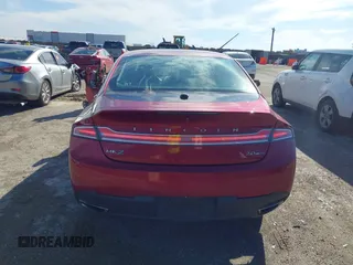 2015 Lincoln MKZ z VIN 3LN6L2G9XFR618075, wystawiony jako IAAI lot #41469247 z przebiegiem 152 966 mil mil oraz . Historia ofert i sprzedaży dostępna na DreamBid. Obrazek 16.
