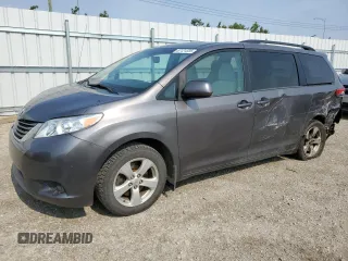 2012 Toyota Sienna LE AAS with VIN 5TDKK3DC9CS271729, listed as a Copart auction lot 62121335 with 153,189 mi miles and Salvage title. Bid and sale history available at DreamBid. Image 1.