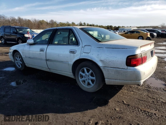 2002 Cadillac Seville Luxury SLS z VIN 1G6KS54Y12U252709, wystawiony jako Copart lot #44379585 z przebiegiem 74 735 mil mil oraz Tytuł czysty. Historia ofert i sprzedaży dostępna na DreamBid. Obrazek 2.