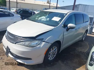 2017 Chrysler Pacifica Touring with VIN 2C4RC1DG6HR633826, listed as a IAAI auction lot 42170041 with 143,481 mi miles and . Bid and sale history available at DreamBid. Image 2.