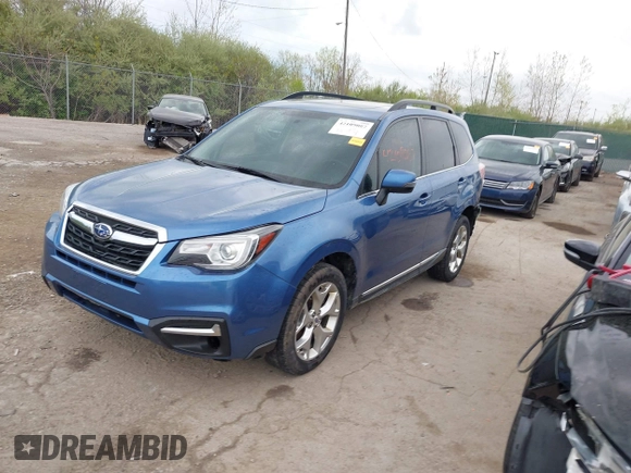 2017 Subaru Forester Touring with VIN JF2SJAWC4HH803275, listed as a IAAI auction lot 42109087 with 114,532 mi miles and . Bid and sale history available at DreamBid. Image 2.