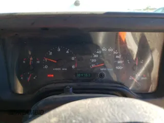 2006 Jeep Wrangler Sport Right Hand Drive with VIN 1J4F449S76P747454, listed as a Copart auction lot 77819214 with 184,763 mi miles and Salvage Title. Bid and sale history available at carsss.com. Image 9.