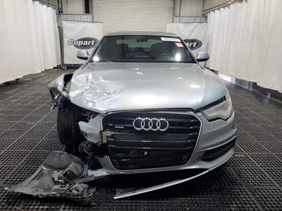 2013 Audi A6 Prestige z VIN WAUHGAFC2DN009438, wystawiony jako Copart lot #53966355 z przebiegiem 167 515 mil mil oraz Czysty tytuł • Clean title. Historia ofert i sprzedaży dostępna na DreamBid. Obrazek 5.