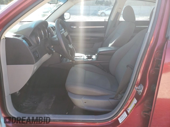 2010 Dodge Charger with VIN 2B3CA4CD8AH146922, listed as a Copart auction lot 77013754 with 131,822 mi miles and Salvage Title. Bid and sale history available at carsss.com. Image 7.