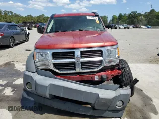 2010 Dodge Nitro SXT z VIN 1D4PT5GK1AW126105, wystawiony jako Copart lot #55306915 z przebiegiem 248 469 mil mil oraz Szkody całkowita. Historia ofert i sprzedaży dostępna na DreamBid. Obrazek 5.