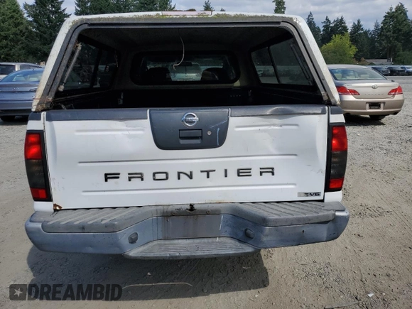 2003 Nissan Frontier XE with VIN 1N6ED29X13C419979, listed as a Copart auction lot 65806585 with 167,535 mi miles and Salvage title. Bid and sale history available at DreamBid. Image 6.