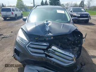 2017 Ford Escape SE z VIN 1FMCU0GD0HUE06774, wystawiony jako IAAI lot #42135955 z przebiegiem 141 807 mil mil oraz . Historia ofert i sprzedaży dostępna na DreamBid. Obrazek 13.