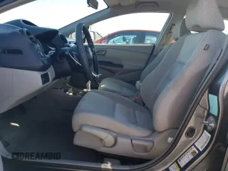 2010 Honda Insight EX with VIN JHMZE2H73AS039935, listed as a Copart auction lot 46192575 with 127,329 mi miles and Salvage Title. Bid and sale history available at DreamBid. Image 7.