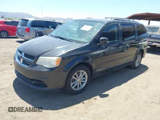 2014 Dodge Grand Caravan SXT with VIN 2C4RDGCG7ER265931, listed as a IAAI auction lot 42141644 with 205,968 mi miles and . Bid and sale history available at DreamBid. Image 2.