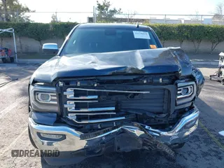 2018 GMC Sierra 1500 with VIN 3GTU1NEC7JG257796, listed as a IAAI auction lot 41570419 with 92,186 mi miles and . Bid and sale history available at DreamBid. Image 12.