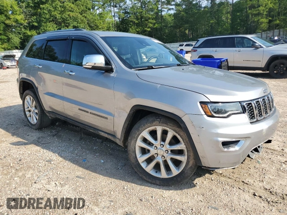 2017 Jeep Grand Cherokee Limited with VIN 1C4RJEBG4HC609212, listed as a Copart auction lot 61796195 with 118,196 mi miles and Salvage title. Bid and sale history available at DreamBid. Image 4.