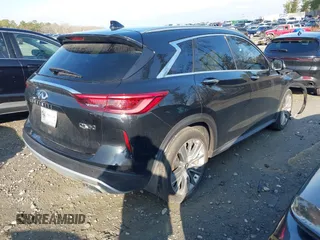 2021 Infiniti QX50 Essential with VIN 3PCAJ5CA9MF100592, listed as a IAAI auction lot 41513164 with 10,388 mi miles and . Bid and sale history available at DreamBid. Image 4.