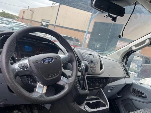 2019 Ford Transit with VIN 1FTYR1ZM2KKB02119, listed as a IAAI auction lot 42263459 with 91,343 mi miles and . Bid and sale history available at DreamBid. Image 2.