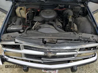 1994 GMC Suburban z VIN 1GKEC16K4RJ762562, wystawiony jako Copart lot #81242184 z przebiegiem 182 583 mil mil oraz Szkoda całkowita • Salvage title. Historia ofert i sprzedaży dostępna na DreamBid. Obrazek 14.
