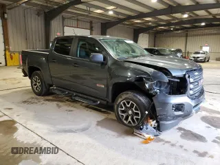 2015 GMC Canyon 4WD SLE with VIN 1GTG6BE37F1118335, listed as a Copart auction lot 85271264 with 58,679 mi miles and Salvage Title. Bid and sale history available at carsss.com. Image 4.