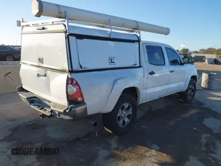 2013 Toyota Tacoma with VIN 3TMLU4EN7DM122791, listed as a IAAI auction lot 41484858 with 236,795 mi miles and . Bid and sale history available at DreamBid. Image 4.
