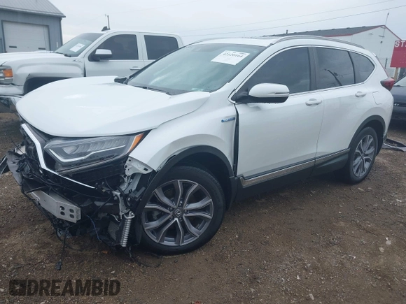 2020 Honda CR-V Touring with VIN 7FART6H9XLE024742, listed as a IAAI auction lot 42120164 with 32,213 mi miles and . Bid and sale history available at DreamBid. Image 2.