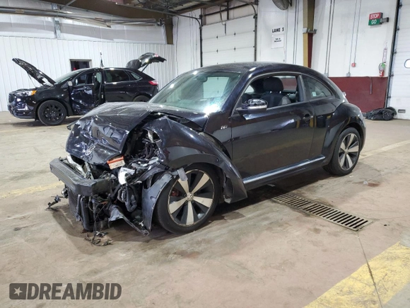 2014 Volkswagen Beetle Turbo R-Line with VIN 3VWVT7ATXEM665178, listed as a Copart auction lot 75652044 with Not Provided miles and Salvage Title. Bid and sale history available at DreamBid. Image 1.