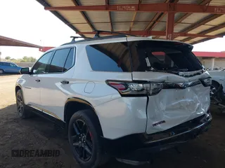 2020 Chevrolet Traverse Premier with VIN 1GNERKKW3LJ117912, listed as a IAAI auction lot 42317330 with 113,576 mi miles and . Bid and sale history available at DreamBid. Image 3.