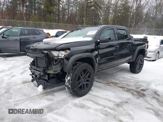 2023 Chevrolet Colorado 4WD Trail Boss with VIN 1GCPTEEK5P1196857, listed as a IAAI auction lot 41540862 with 13,681 mi miles. Bid and sale history available at carsss.com. Image 2.