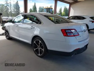 2015 Ford Taurus Limited with VIN 1FAHP2J81FG118224, listed as a IAAI auction lot 42402947 with 142,885 mi miles and . Bid and sale history available at DreamBid. Image 3.