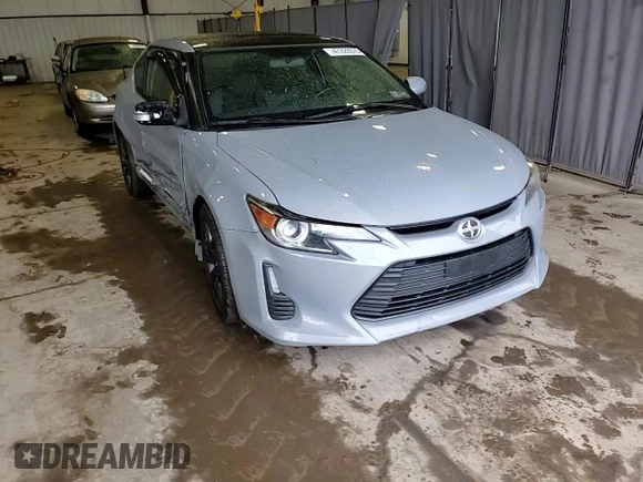 2014 Scion tC z VIN JTKJF5C7XE3071780, wystawiony jako Copart lot #47220975 z przebiegiem 102 630 mil mil oraz Szkody całkowita. Historia ofert i sprzedaży dostępna na DreamBid. Obrazek 13.