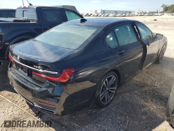 2020 BMW 7 Series 750i xDrive with VIN WBA7U2C0XLGM27270, listed as a Copart auction lot 77241404 with 68,998 mi miles and Salvage Title. Bid and sale history available at carsss.com. Image 3.