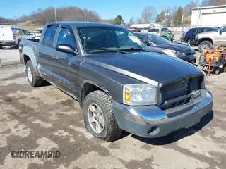 2006 Dodge Dakota SLT z VIN 1D7HW48NX6S639546, wystawiony jako IAAI lot #41709112 z przebiegiem 182 478 mil mil oraz . Historia ofert i sprzedaży dostępna na DreamBid. Obrazek 1.