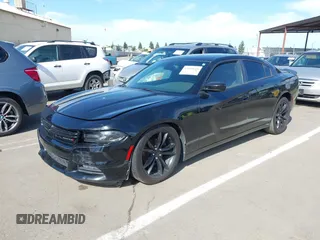 2016 Dodge Charger SXT with VIN 2C3CDXHG6GH146764, listed as a IAAI auction lot 42020618 with 154,693 mi miles and . Bid and sale history available at carsss.com. Image 2.
