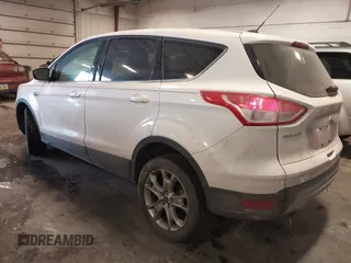 2013 Ford Escape SEL with VIN 1FMCU9HX0DUD85206, listed as a IAAI auction lot 41623110 with 99,223 mi miles. Bid and sale history available at carsss.com. Image 3.