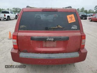 2009 Jeep Patriot Sport z VIN 1J4FT28A49D122175, wystawiony jako Copart lot #51518055 z przebiegiem 127 815 mil mil oraz Szkoda całkowita • Salvage title. Historia ofert i sprzedaży dostępna na DreamBid. Obrazek 6.
