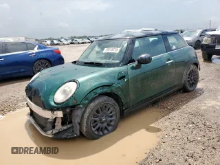 2014 MINI Hardtop with VIN WMWXM5C51ET935828, listed as a Copart auction lot 59818315 with 121,167 mi miles and Salvage title. Bid and sale history available at DreamBid. Image 1.