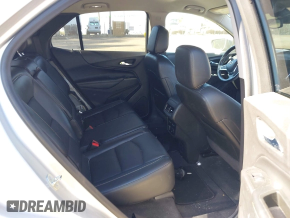 2018 Chevrolet Equinox Premier with VIN 3GNAXVEV4JS598239, listed as a IAAI auction lot 42112886 with 142,093 mi miles and . Bid and sale history available at DreamBid. Image 8.
