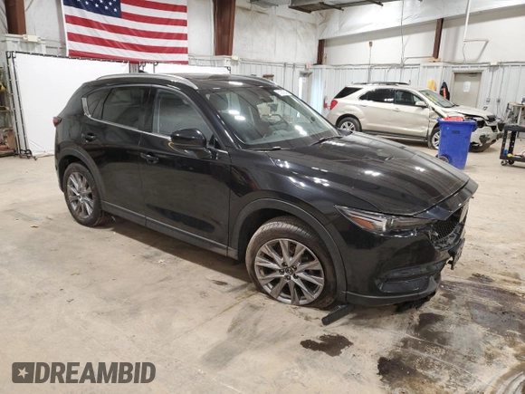 2021 Mazda CX-5 Grand Touring with VIN JM3KFBDM7M0467445, listed as a Copart auction lot 51287645 with 72,241 mi miles and Non Repairable. Bid and sale history available at carsss.com. Image 4.