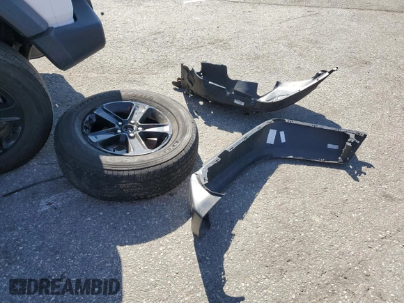 2023 Jeep Wrangler Sport Altitude with VIN 1C4HJXDG3PW623930, listed as a Copart auction lot 46733035 with 26,032 mi miles and Salvage Title. Bid and sale history available at DreamBid. Image 15.