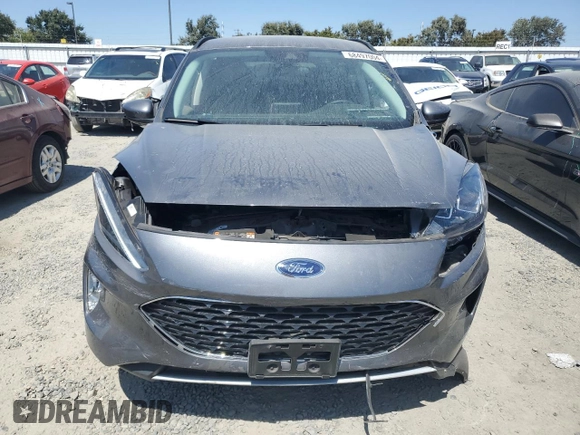 2021 Ford Escape SEL Hybrid with VIN 1FMCU0CZ4MUB20681, listed as a Copart auction lot 68497004 with 15,279 mi miles and Salvage title. Bid and sale history available at DreamBid. Image 5.