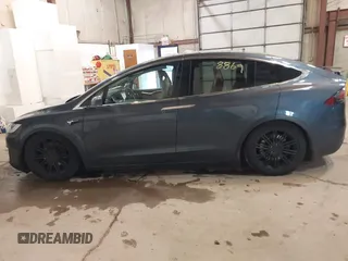 2016 Tesla Model X 70D with VIN 5YJXCBE2XGF025303, listed as a IAAI auction lot 41558869 with 77,793 mi miles and . Bid and sale history available at DreamBid. Image 15.