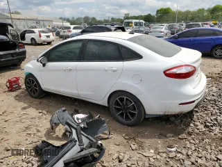 2016 Ford Fiesta SE z VIN 3FADP4BJ9GM105143, wystawiony jako Copart lot #55535655 z przebiegiem 106 599 mil mil oraz Czysty tytuł • Clean title. Historia ofert i sprzedaży dostępna na DreamBid. Obrazek 2.
