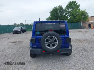 2019 Jeep Wrangler Unlimited Sahara with VIN 1C4HJXEG1KW599117, listed as a IAAI auction lot 42602241 with 109,552 mi miles and . Bid and sale history available at DreamBid. Image 16.