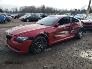 2009 BMW 6 Series 650i with VIN WBAEA53549CV92728, listed as a Copart auction lot 82610144 with 118,803 mi miles and Salvage Title. Bid and sale history available at carsss.com. Image 1.