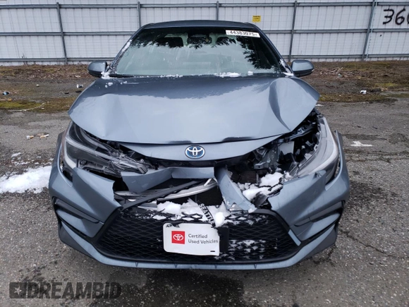 2023 Toyota Corolla Hybrid LE with VIN JTDBDMHE9P3005744, listed as a Copart auction lot 44383075 with 19,528 mi miles and Salvage Title. Bid and sale history available at carsss.com. Image 5.