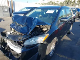 2014 Mazda 5 Sport with VIN JM1CW2BL1E0163682, listed as a IAAI auction lot 41344215 with 63,811 mi miles and . Bid and sale history available at carsss.com. Image 17.