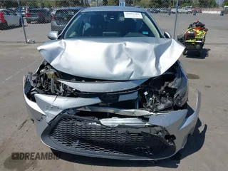 2020 Toyota Corolla LE with VIN JTDEPRAE9LJ020990, listed as a IAAI auction lot 42087507 with 54,314 mi miles and . Bid and sale history available at DreamBid. Image 6.