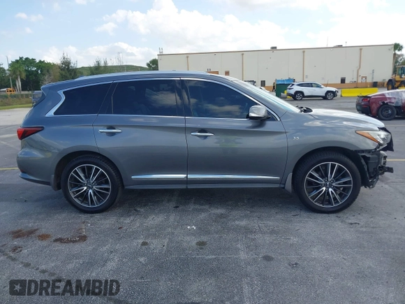 2016 Infiniti QX60 with VIN 5N1AL0MM1GC510760, listed as a IAAI auction lot 41990248 with 60,296 mi miles and . Bid and sale history available at DreamBid. Image 13.